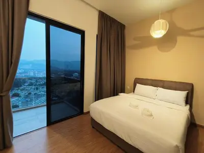 a bedroom with a bed and a large window at Elegant 2BR Luxury Suite in Haaven in George Town