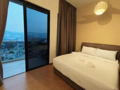 a bedroom with a large bed and a large window at Elegant 2BR Luxury Suite in Haaven in George Town