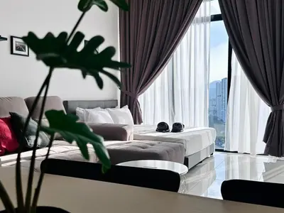a hotel room with two beds and a large window at Luxury 2BR SunnySuite Sky Pool Breathtaking Views in George Town