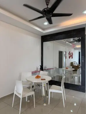 a dining room with a table and chairs and a ceiling fan at Venus Home 3Room Pool,PlayGround,Free Wifi,6Pax in Seri Manjung