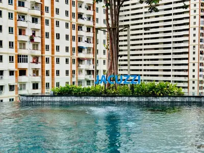 a large body of water in front of a tall building at Classic House in Georgetown 3BR 10pax in George Town