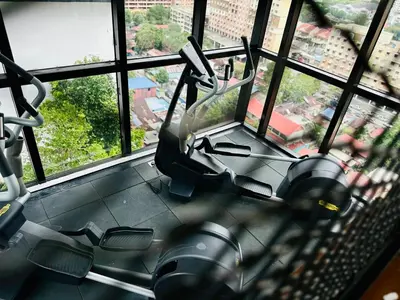 a view of a gym with two exercise bikes at Charming Haven- Relaxing Retreat Nearby Airpor 10pax in George Town