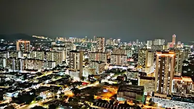 a view of a city at night with buildings at Comfort Stay Family Home 3BR 10PAX in George Town