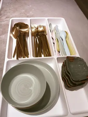 a tray with a plate and utensils on a table at Senju Georgetown Heritage PrewarHouse 4BR 5-15 pax in George Town