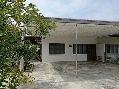 a white house with a porch with a patio at Aloe Vera Homestay - 3 Bed Rooms Corner House in Kamunting