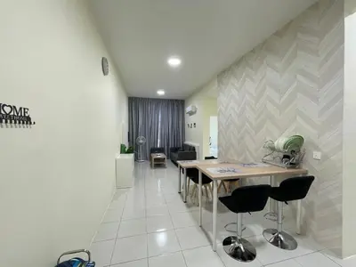a dining room with a table and chairs at The Anderson Ipoh Town in Ipoh