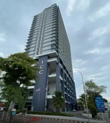 a tall building with a sign on the side of it at ICC Suites Ipoh Walking distance to Mall in Ipoh