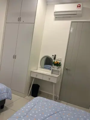a bedroom with a mirror and a bed at ICC Suites Ipoh Walking distance to Mall in Ipoh