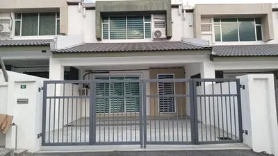 a gate in front of a house at Gaya's Homestay Sri Klebang in Ipoh