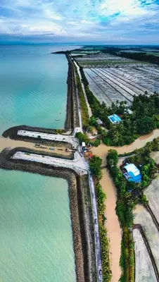 an aerial view of a beach next to the water at Cozy Home Aman Selesa Netflix Wifi Usm in Parit Buntar