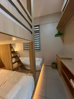 a small room with two bunk beds in it at PrimaStay Ipoh Palo for 7 Pax in Ipoh