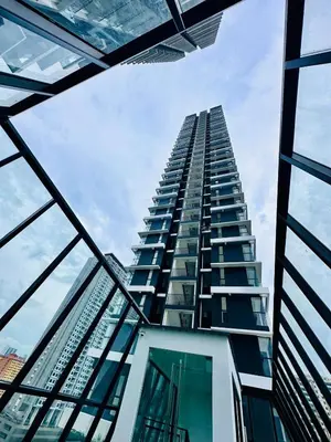 a tall building looking up into the sky at Classic House In Georgetown 3br 10pax in George Town