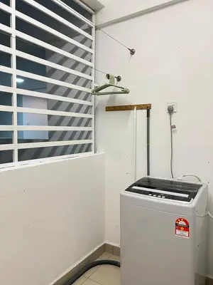 a washing machine in a room with a window at G Home 2 - Ipoh City Centre The Majestic 2R2B in Ipoh