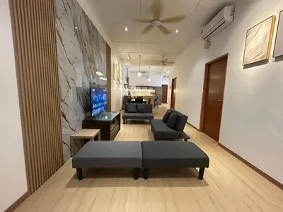a living room with a couch and chairs and a tv at Kaka Pool Homestay TmnIntan EventAllowed in Sungai Petani