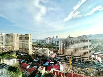 a view of a city with tall buildings at Groups & Families Spacious Infinity Pool 3br 10pax in George Town