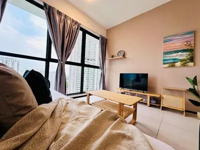 a living room with a large window and a television at luxury apartment 3br 10 pax in George Town