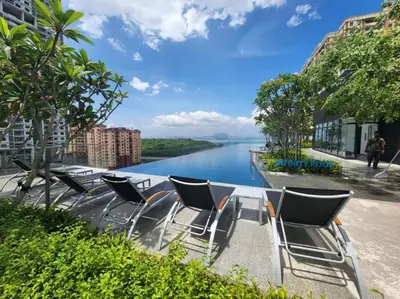 a table and chairs with a view of a river at luxury apartment 3br 10 pax in George Town