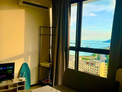 a hotel room with a view of a city from a window at UB suite aparment for food hunter 3br 10 pax in George Town