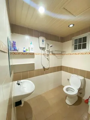 a bathroom with a toilet and a sink at Wanie CH Homestay 1 Brinchang Cameron Highlands in Brinchang
