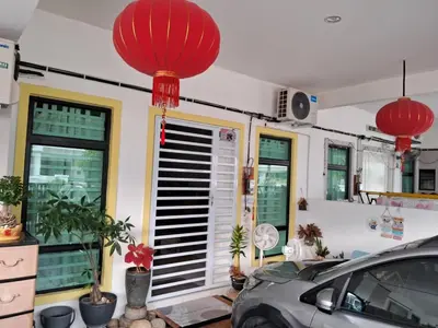 a car parked in front of a building with red lanterns at HEE & PENNIE House in Ipoh