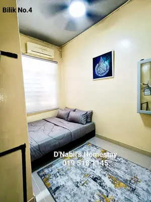 a small living room with a couch in a room at D Nabils Homestay Musslim Sahaja in Kulim