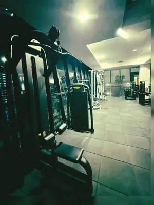 a gym with a bench in a gym at Stunning Luxury Breathtaking Sea & City Views 3BR 12PAX in Jelutong