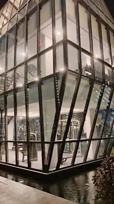 a building with a bunch of glass windows at Stunning Luxury Breathtaking Sea & City Views 3BR 12PAX in Jelutong