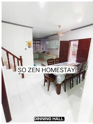 a dining room and kitchen with a table and chairs at So Zen Homestay in Taiping