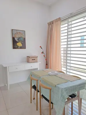 a dining room with a table and a desk at Lunas Kulim Hi Tech BKE Q Comfort in Kubang Semang