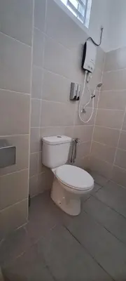 a bathroom with a toilet and a shower at Lunas Kulim Hi Tech BKE Q Comfort in Kubang Semang