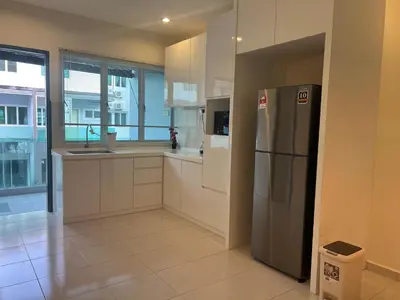 a large kitchen with a stainless steel refrigerator at Omari 2 Marina Island Homestay Lumut in Lumut