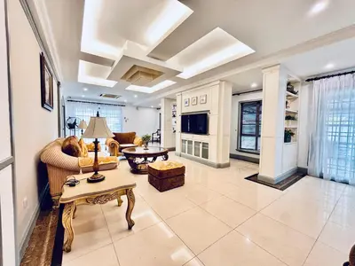a living room with a couch and a table at Regent Event & Leisure in Ipoh
