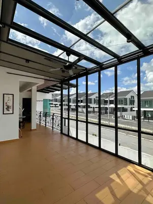 a large open room with a view of a building at Ipoh Lahat Mines Private Pool Lake Villa by IWH Suites in Lahat