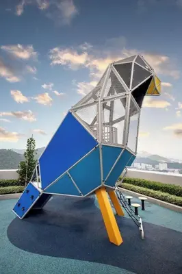 a sculpture of a building on top of a bench at Cozy 2BR Sky Pool & Panoramic Views 1-6 Guests in Bayan Lepas