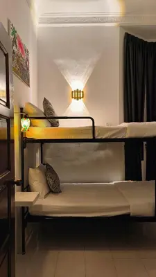 a couple of bunk beds in a room at Frangipine Villa in Tapah