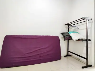 a purple mattress sitting on a shelf in a room at Do not book in Ipoh