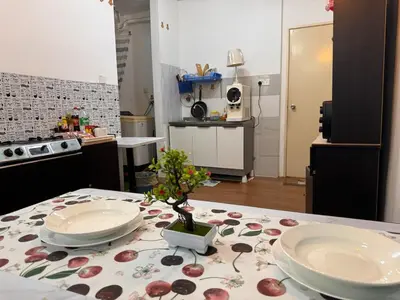 a kitchen with a table with two plates on it at 2pax 1car only Malaysian guest only bayan lepas in Bayan Lepas