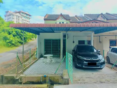 a car parked in a garage next to a house at Homestay Hill View Lumut in Lumut