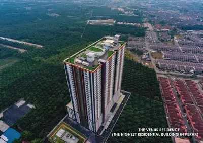 an overhead view of a tall building in a city at Venus Home Retreat - Pool,Gym,Playground,Rooftop Garden View in Kampong Lumut Kiri