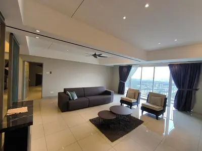 a living room with a couch and a table and chairs at Venus Home Retreat - Pool,Gym,Playground,Rooftop Garden View in Kampong Lumut Kiri