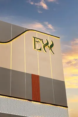 a fedex sign on the side of a building at Edenwood Hotel in George Town