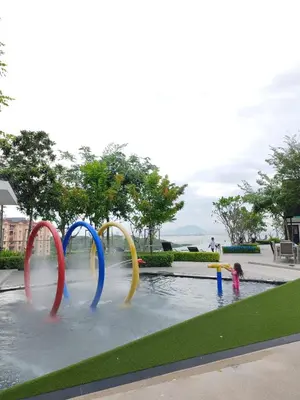 two children are playing in a water park at Spacious 3BR Retreat Comfort & Style in the City 2-10pax in Jelutong