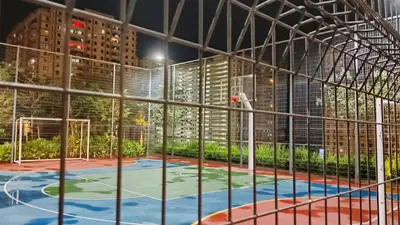 a basketball court inside a building at night at Spacious 3BR Retreat Comfort & Style in the City 2-10pax in Jelutong