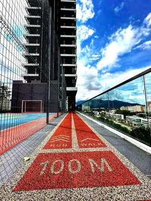 a red floor with the word on a building at Cozy & Chic 3BR Apartment Great Location 2-10pax in Jelutong