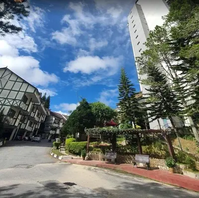 a park with a gazebo in front of a building at Kea Farm Sweet Cozy Resort Copthorne in Brinchang