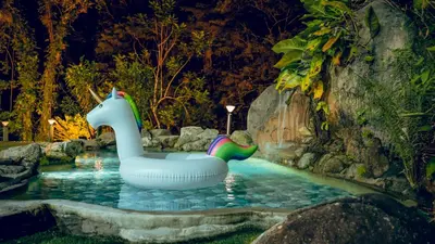 a pool with a unicorn float in the water at Villa Sapphire by Blue Robin - Private Taiping Villa 20pax River & Waterfall in Taiping
