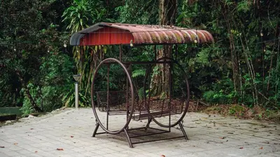 a metal bench with a roof on top of it at Villa Sapphire by Blue Robin - Private Taiping Villa 20pax River & Waterfall in Taiping