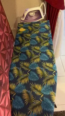 a bag with a blue and yellow palm tree pattern at Md homestay in Kampong Kubang Menderong