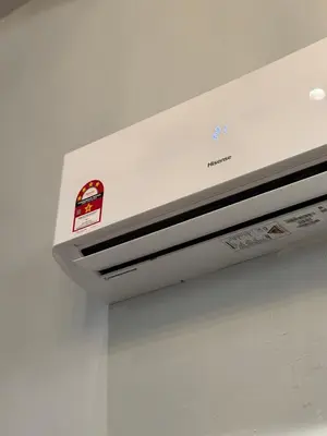 a white ceiling with a red sticker on it at Industrial Loft Tinyhouse Homestay - 2 Queen Bed, Free Netflix, Prime & Wi-Fi Near Bukit Mertajam in Kubang Semang
