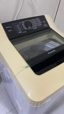 a microwave oven sitting on top of a counter at Assyifa Homestay Kulim in Kulim